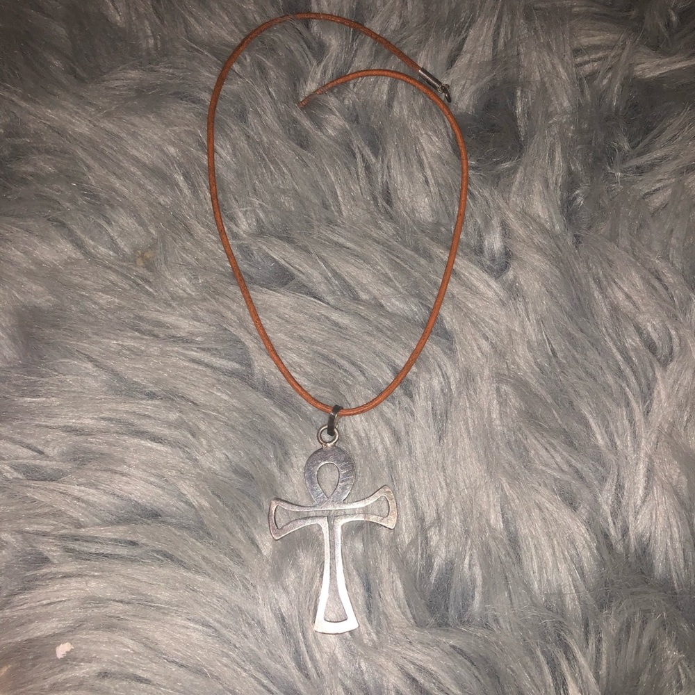 Silver on leather strap cross bought in Mexico